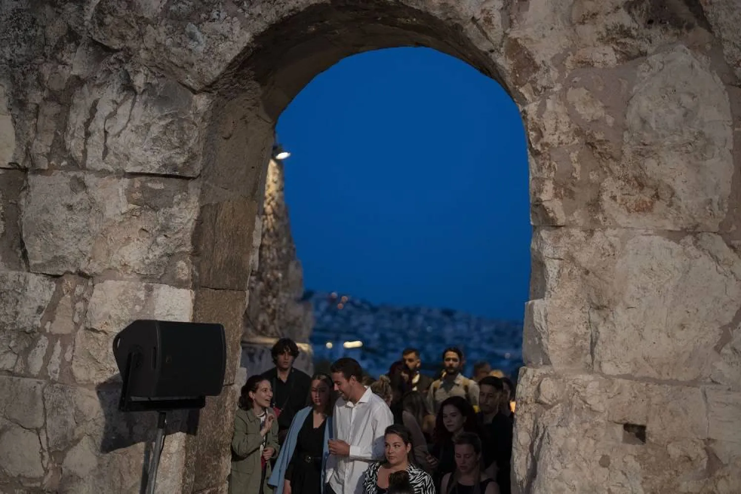 Spectators enter the Odeon of Herodes Atticus for a performance of "Madame Butterfly" in Athens, on Thursday, June 1, 2023. (AP)
