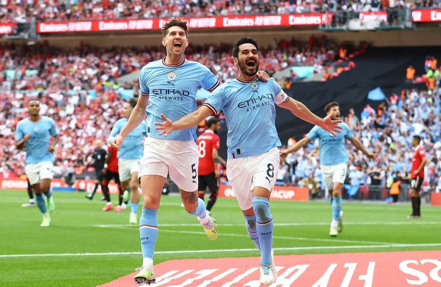 Football - FA Cup Final - Manchester City v Manchester United - Wembley Stadium, London, Britain - June 3, 2023 Manchester City's Ilkay Gundogan celebrates scoring their second goal with John Stones. (Reuters) 