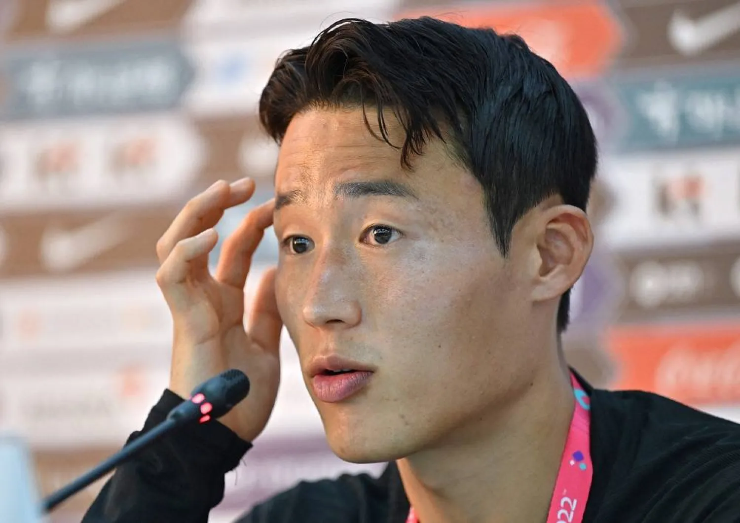In this file photo taken on November 22, 2022 South Korea's midfielder Son Jun-ho gives a press conference before a training session at Al Egla Training Site 5 in Doha during the Qatar 2022 World Cup football tournament. (AFP) 