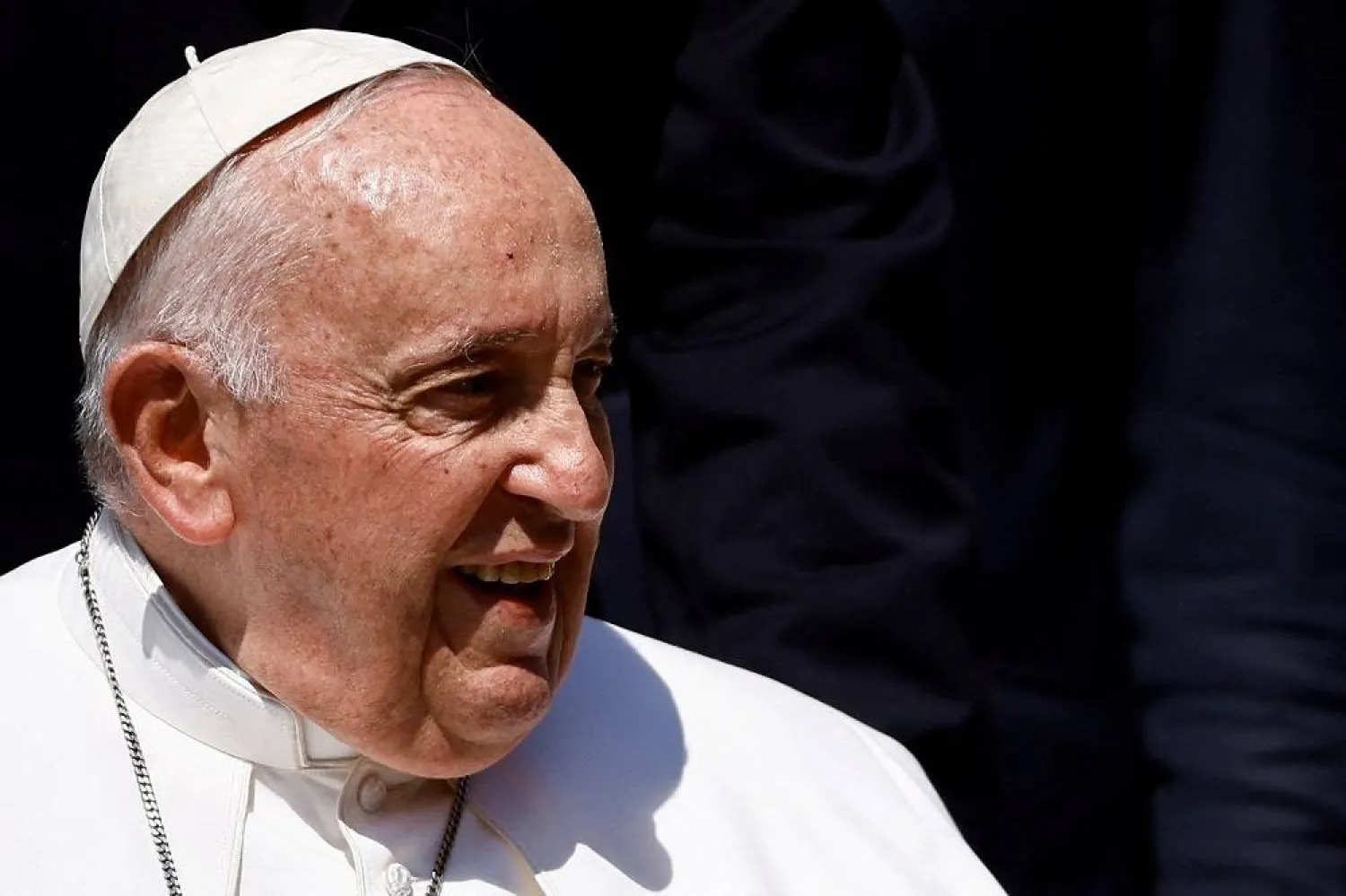 Pope Francis reacts as he meets faithful during the weekly general audience in St. Peter's Square at the Vatican, June 7, 2023. (Reuters)