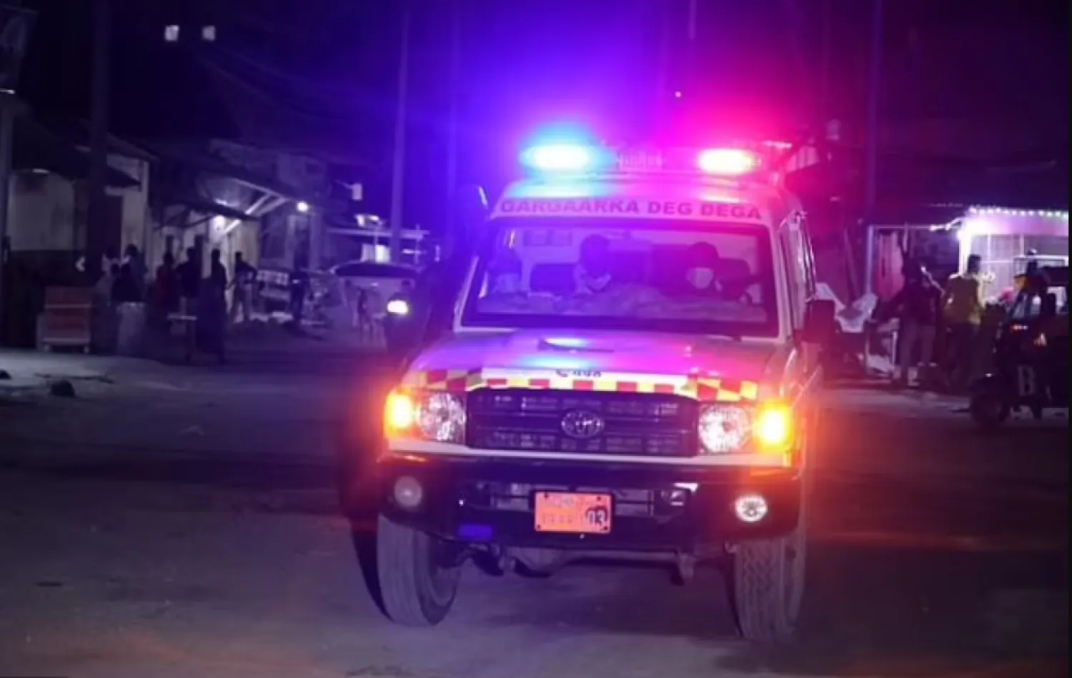 A security perimeter was set up around a hotel at Mogadishu's Lido Beach after militants from the Al-Shabaab group launched an attack - AFP