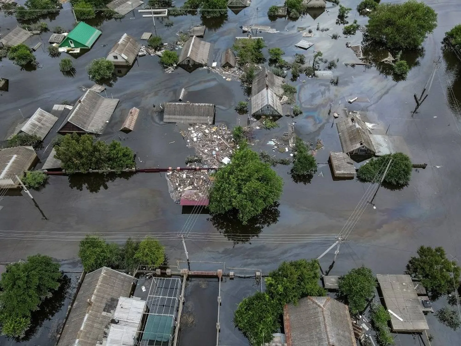 An aerial view shows a flooded area after the Nova Kakhovka dam breached, amid Russia's attack on Ukraine, in Kherson, Ukraine June 10, 2023. (Reuters) 