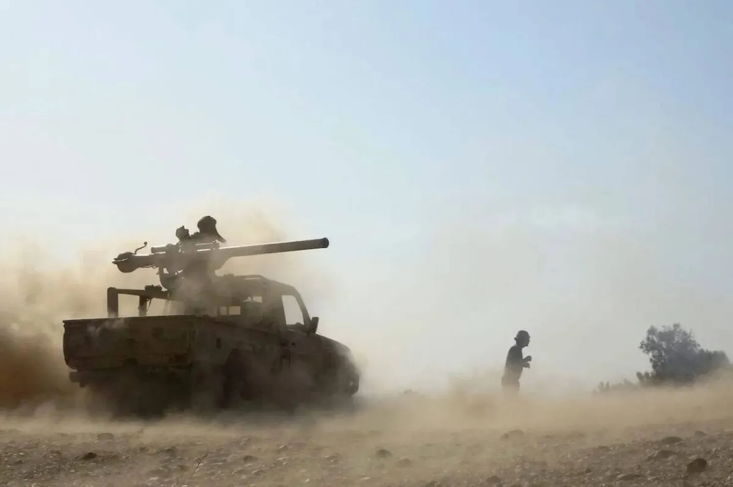 Pro-government troops repel a Houthi offensive on Marib, on 14 February 2021. (AFP via Getty Images) 