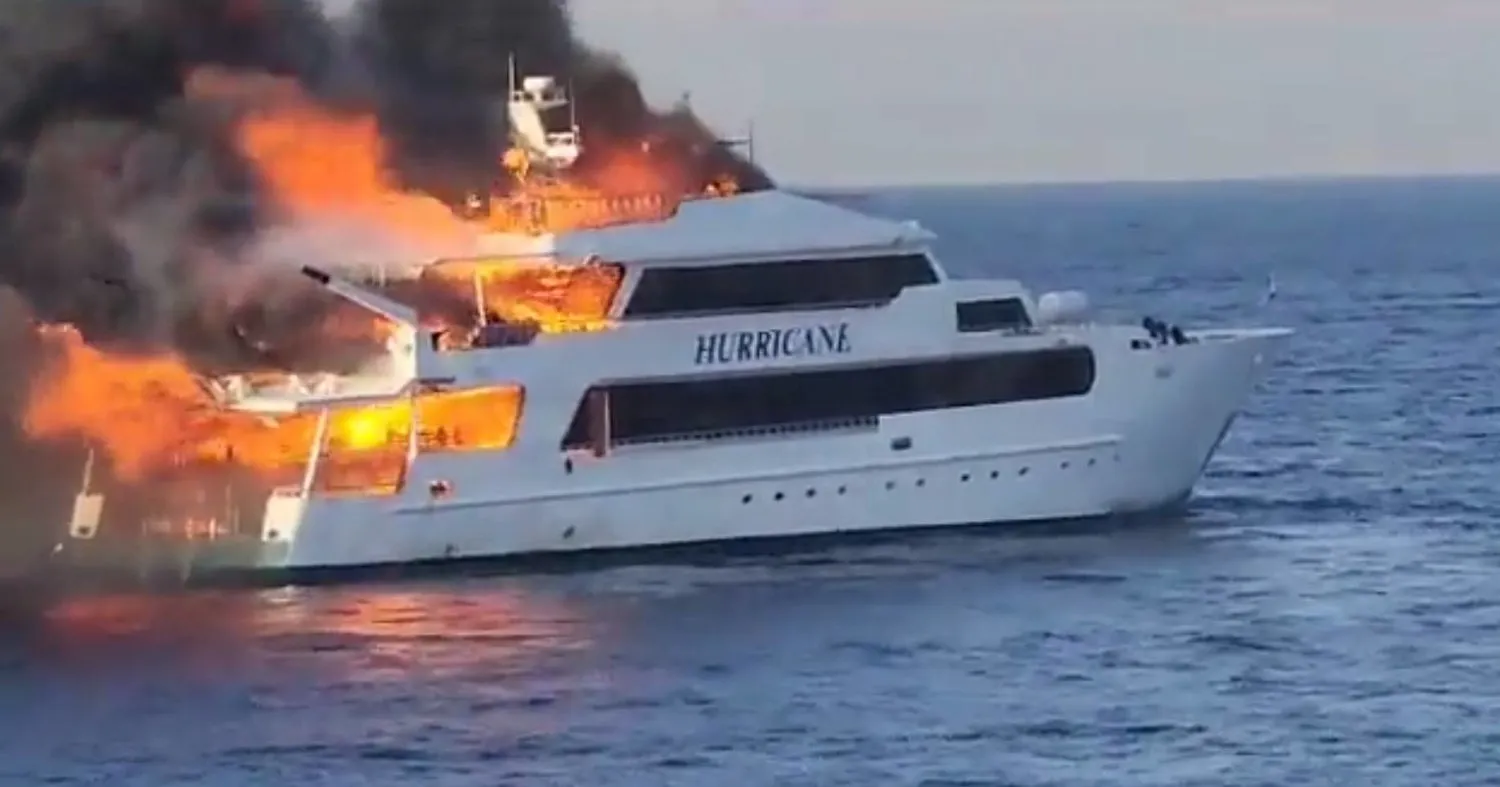  Plumes of smoke erupt from a yacht on fire in Marsa Alam, Egypt, June 11, 2023 in this screengrab. (Reuters)