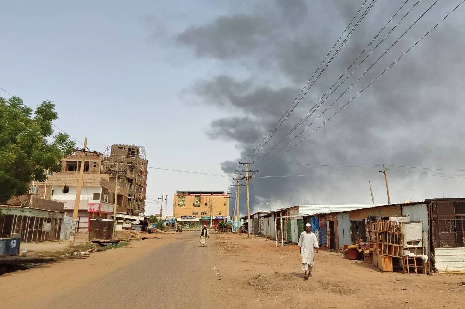 Smoke rises amid ongoing violence in Sudan - AFP/File