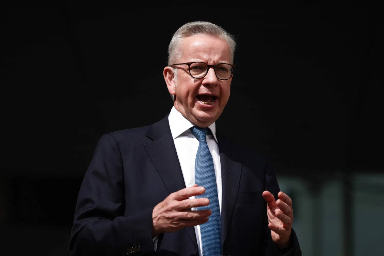 وزير الدولة لشؤون التنمية الاقتصادية والإسكان والمجتمعات في بريطانيا مايكل جوف (أ.ف.ب)