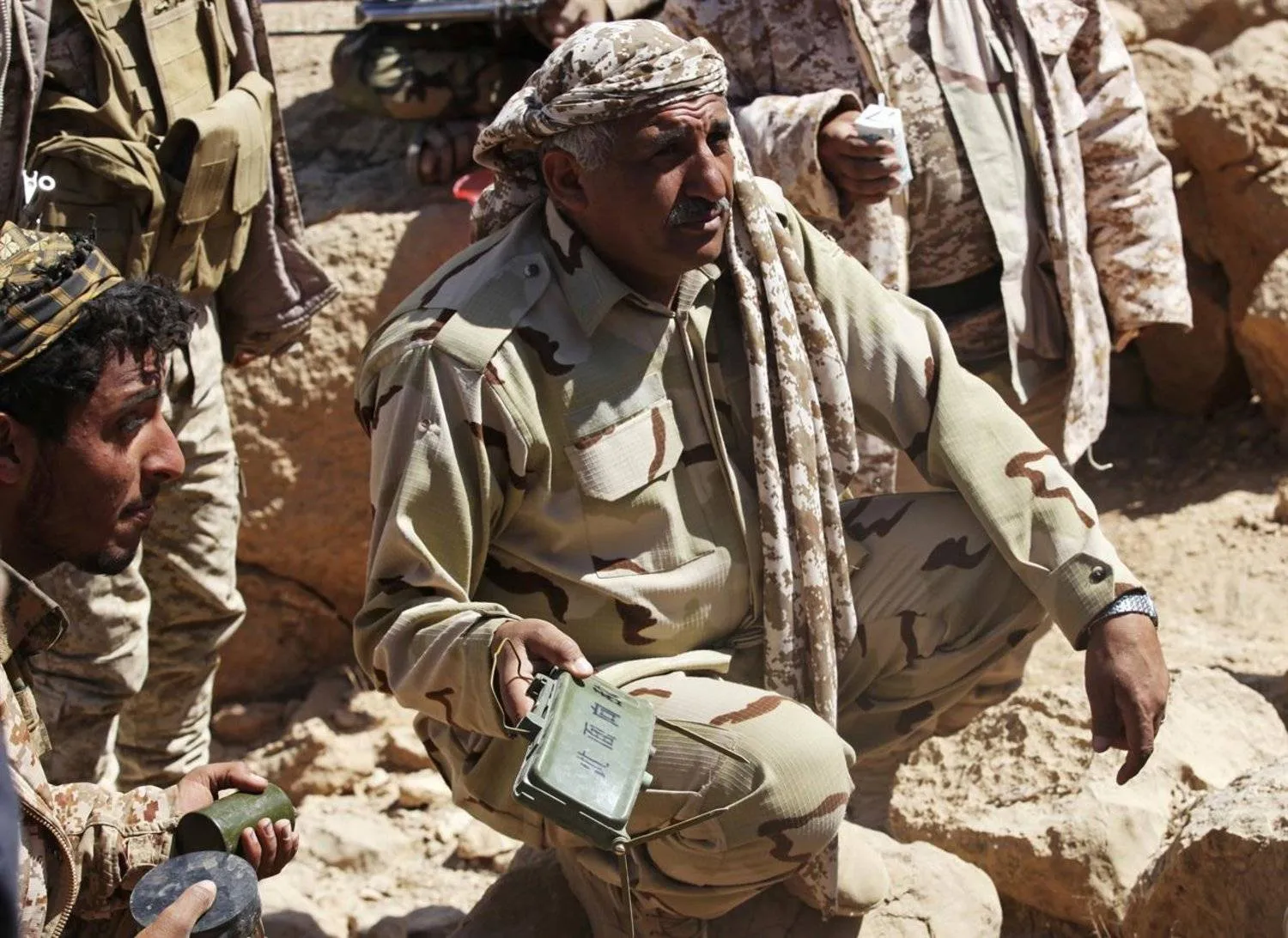 In this Feb. 2, 2018 file photo, Maj. Gen. Nasser Ali al-Daibany of Yemen's internationally recognized government shows journalists a deactivated mine on the outskirts of Sanaa, Yemen. (AP Photo/Jon Gambrell, File)

