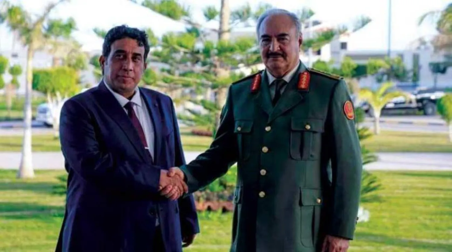 المشير حفتر في لقاء سابق مع محمد المنفي رئيس المجلس الرئاسي (الوحدة)