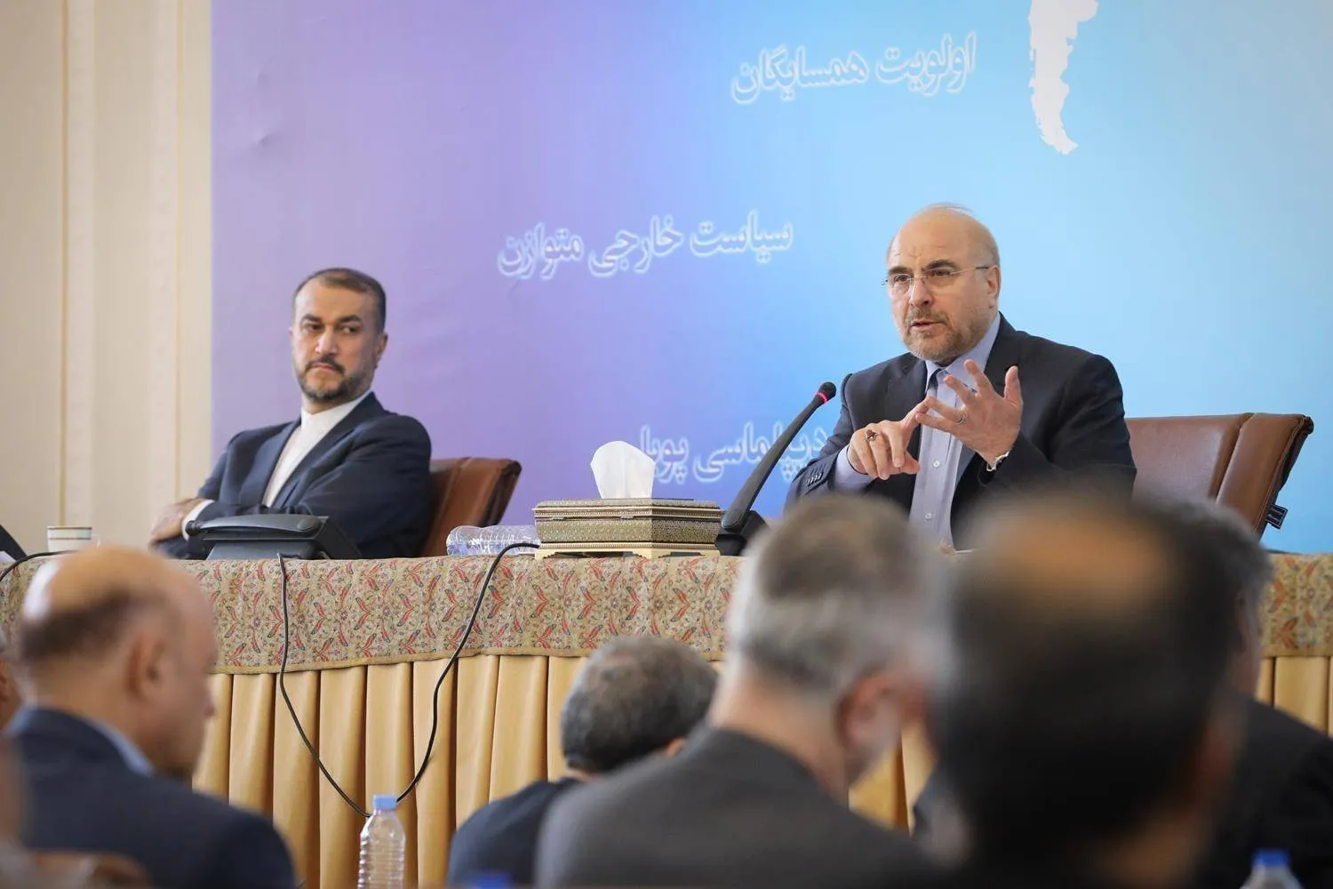 Parliament Speaker Mohammad Baqer Qalibaf and Abdollahian during an annual conference for ambassadors last month (Iranian Foreign Ministry)