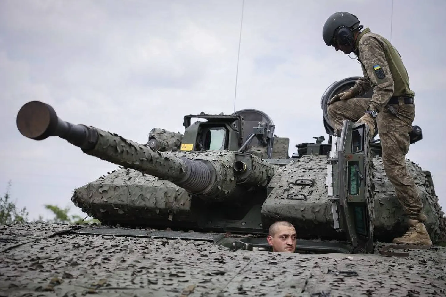 Ukrainian soldiers on a Swedish CV90 infantry fighting vehicle at their positions near Bakhmut, Donetsk region, Ukraine, Sunday, June 25, 2023. (AP)