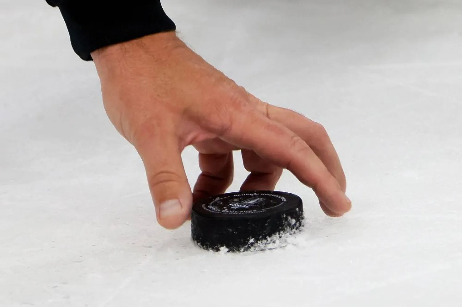 The referee grabs the puck during the third period in Game Four of the 2023 NHL Stanley Cup Final between the Vegas Golden Knights and the Florida Panthers at FLA Live Arena on June 10, 2023 in Sunrise, Florida. (Getty Images/AFP) 