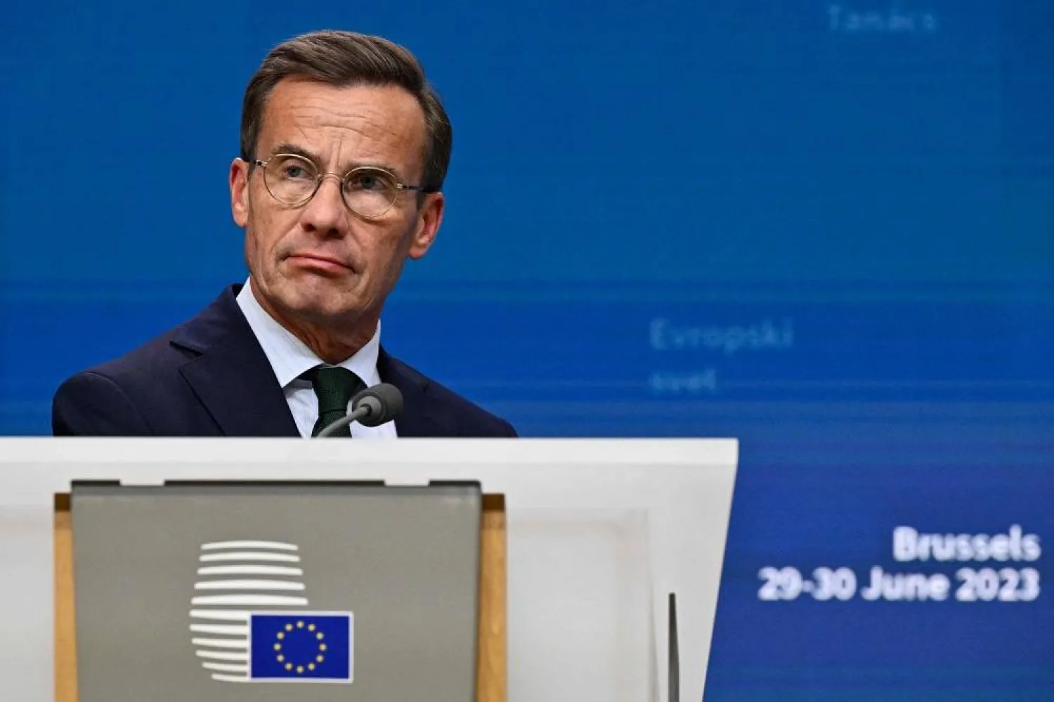Swedish Prime Minister Ulf Kristersson looks on during a final press conference on the second day of a meeting of the European Council at The Europa Building in Brussels on June 30, 2023. (AFP) 