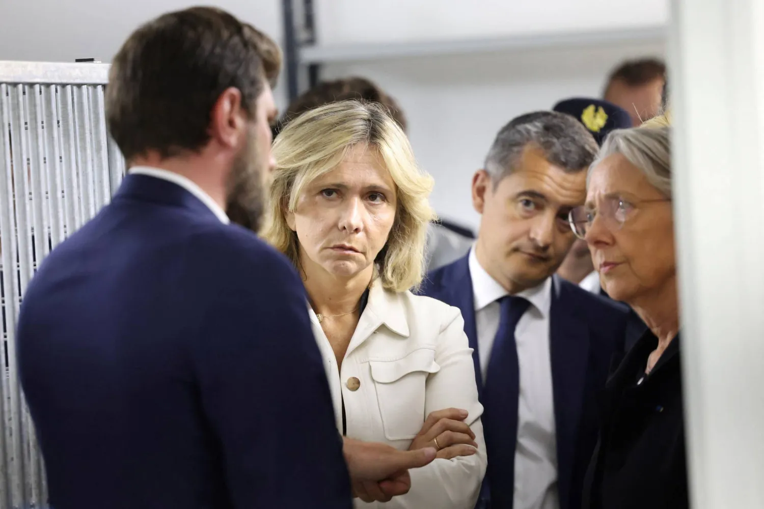 French Prime Minister Elisabeth Borne, Ile-de-France Region President Valerie Pecresse, Interior Minister Gerald Darmanin talk with Mayor of L'Hay-les-Roses Vincent Jeanbrun as they meet with municipal police, after rioters rammed a vehicle into the Mayor's house overnight, at the City Hall in L'Hay-les-Roses, south of Paris, France July 2, 2023. Charly Triballeau/Pool via REUTERS