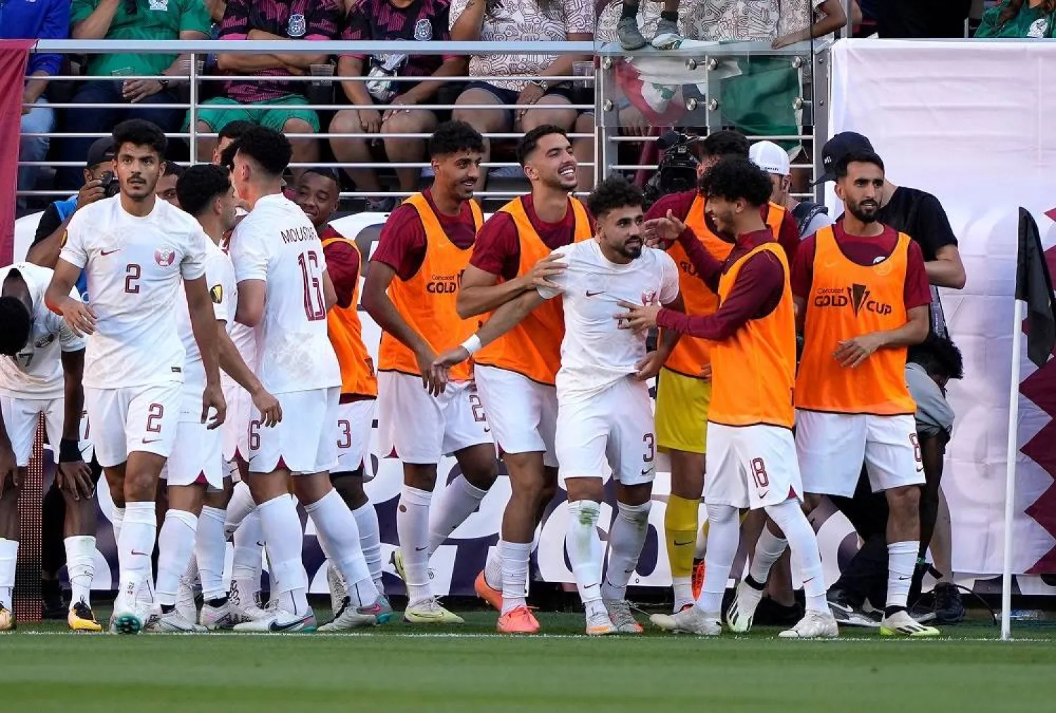 Hazem Shehata #3 of Qatar is congratulated by teammates after he scored a goal against Mexico in the first half during the Group B match of 2023 CONCACAF Gold Cup at Levi's Stadium on July 02, 2023 in Santa Clara, California. (Getty Images via AFP) 