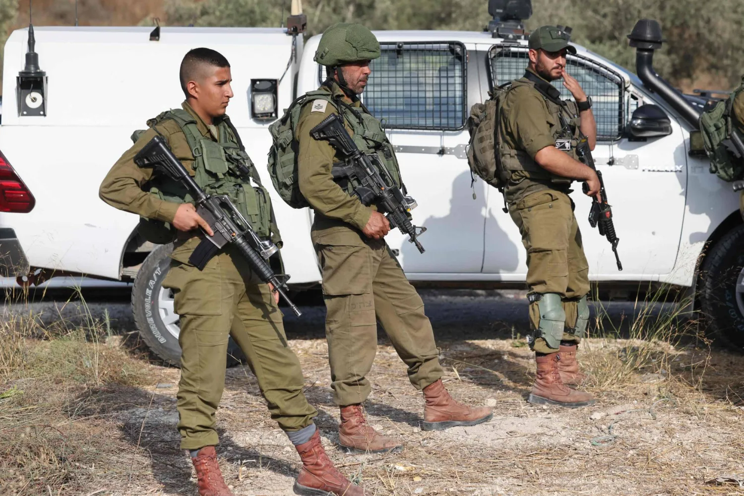 Israeli soldiers secures the site of a reported attack in the Kdumim settlement, north of Nablus, in the occupied West Bank on July 6, 2023. (Photo by AHMAD GHARABLI / AFP)
