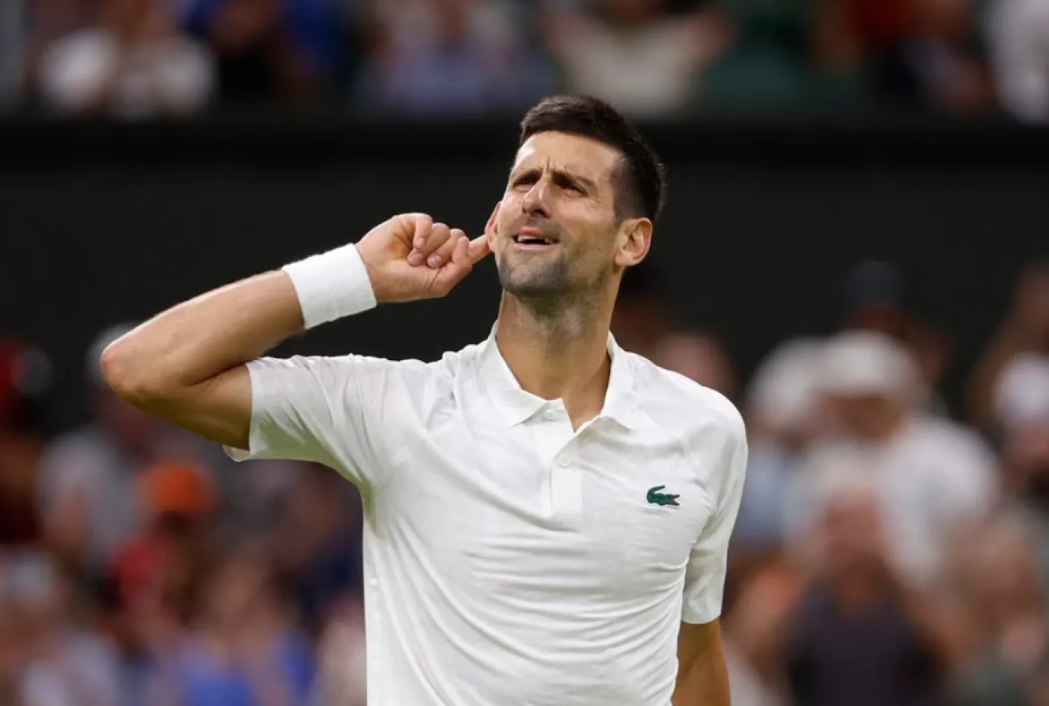 Tennis - Wimbledon - All England Lawn Tennis and Croquet Club, London, Britain - July 7, 2023 Serbia's Novak Djokovic celebrates winning his third round match against Switzerland's Stan Wawrinka REUTERS/Andrew Couldridge



