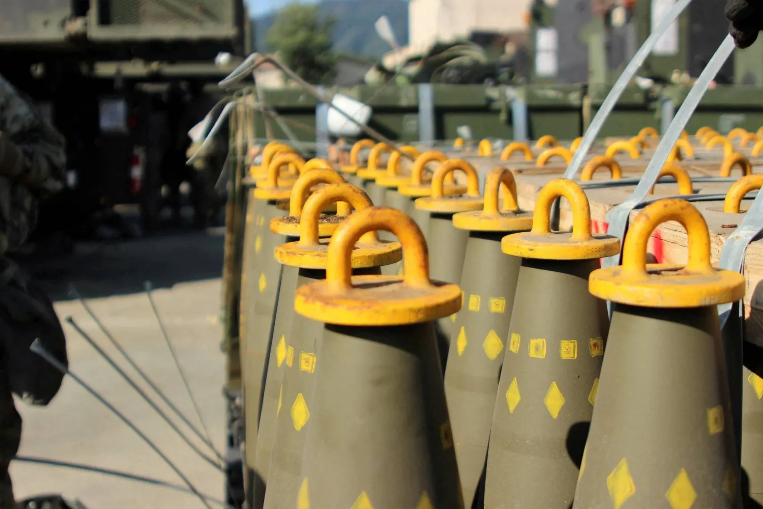 FILE PHOTO: Dozens of 155mm Base Burn Dual Purpose Improved Conventional Munitions (DPICM) rounds wait to be loaded at a US Army motor pool at Camp Hovey, South Korea September 20, 2016.  US Army/2nd Lt. Gabriel Jenko/Handout via REUTERS