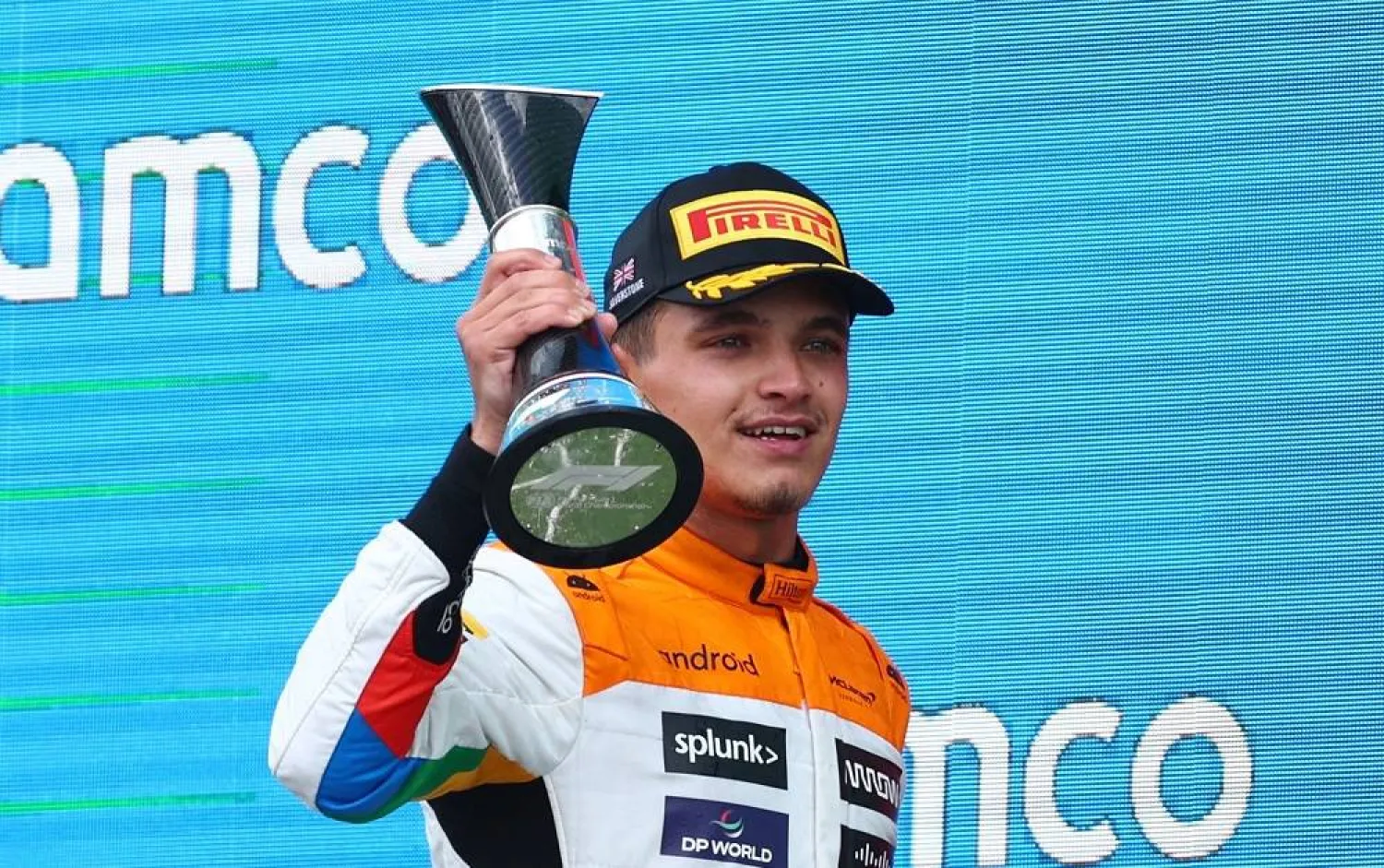 Formula One F1 - British Grand Prix - Silverstone Circuit, Silverstone, Britain - July 9, 2023 McLaren's Lando Norris celebrates with a trophy on the podium after finishing the race in second place. (Reuters)