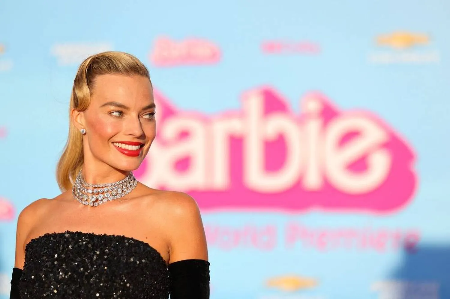 Margot Robbie poses on the pink carpet for the world premiere of the film "Barbie" in Los Angeles, California, US, July 9, 2023. (Reuters) 