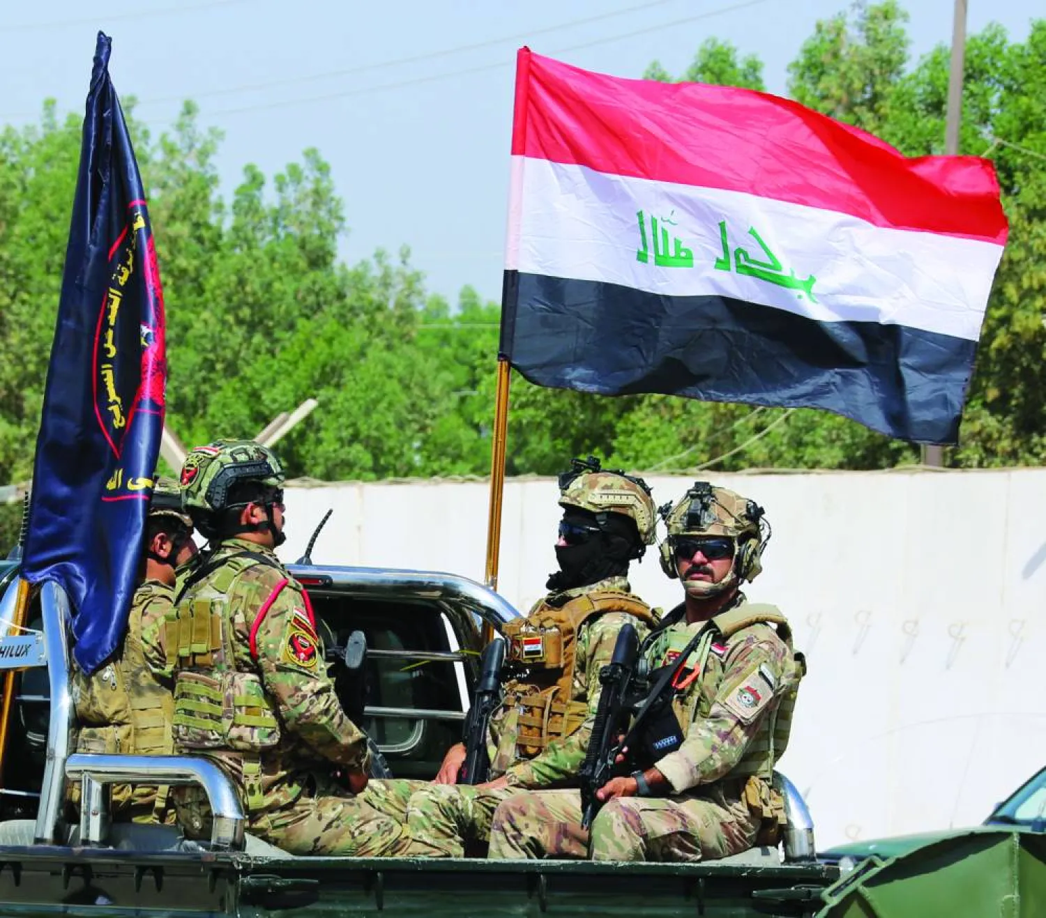 جانب من حفل تخريج جنود في وحدة تابعة للقوات الخاصة العراقية بقاعدة عسكرية غرب بغداد (إ.ب.أ)