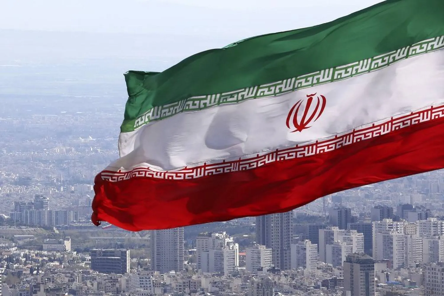 Iran's national flag waves in Tehran, Iran, March 31, 2020. (AP)