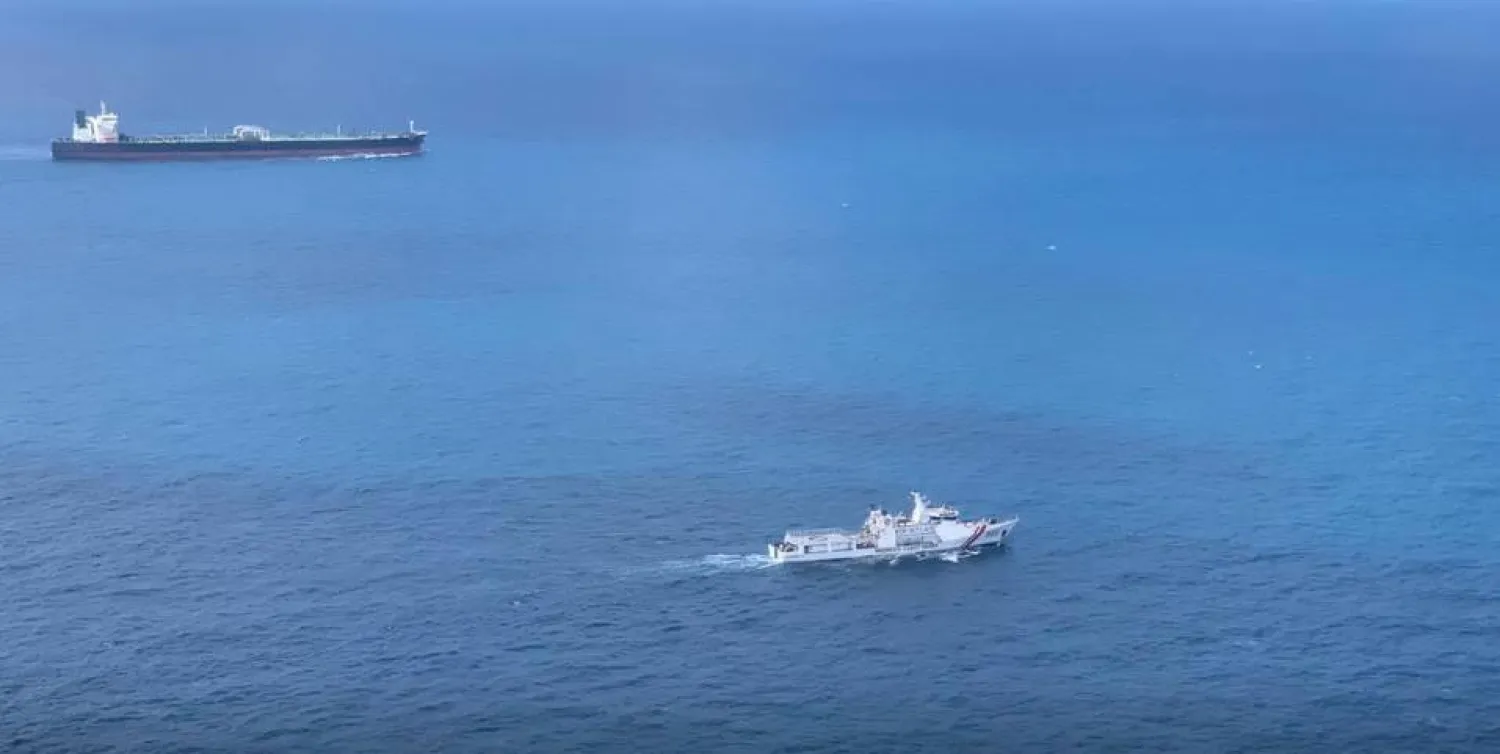 An Iranian-flagged crude oil tanker is escorted to Batam, Riau islands, Indonesia. Reuters file photo