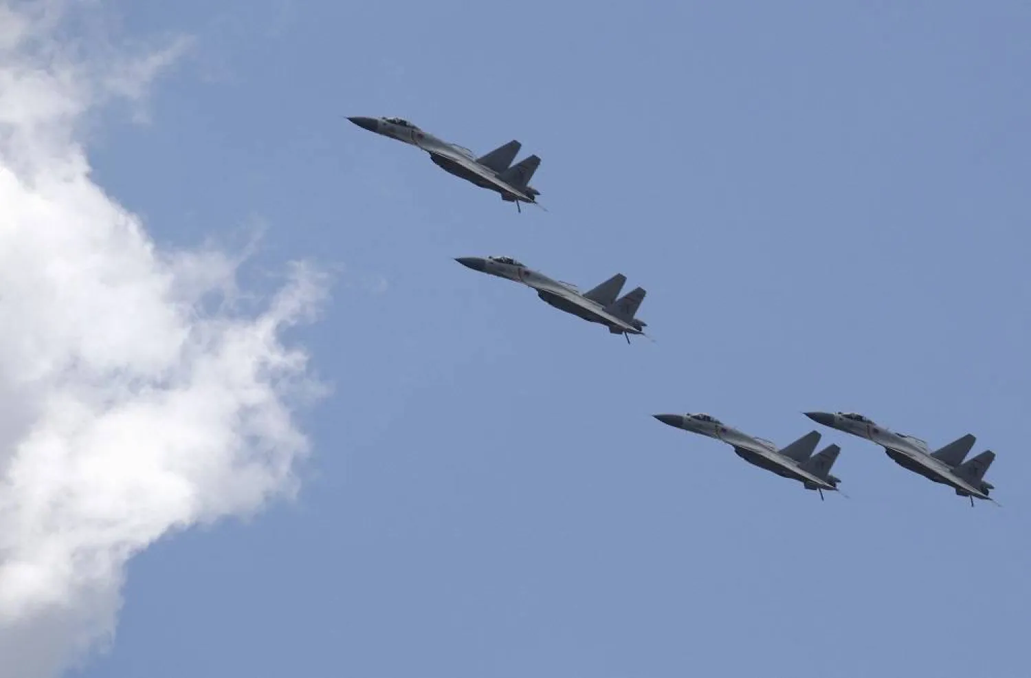 J-11B fighter jets of the Chinese Air Force fly in formation during a training session for the upcoming parade marking the 70th anniversary of the end of World War Two, on the outskirts of Beijing, July 2, 2015. (Reuters)
