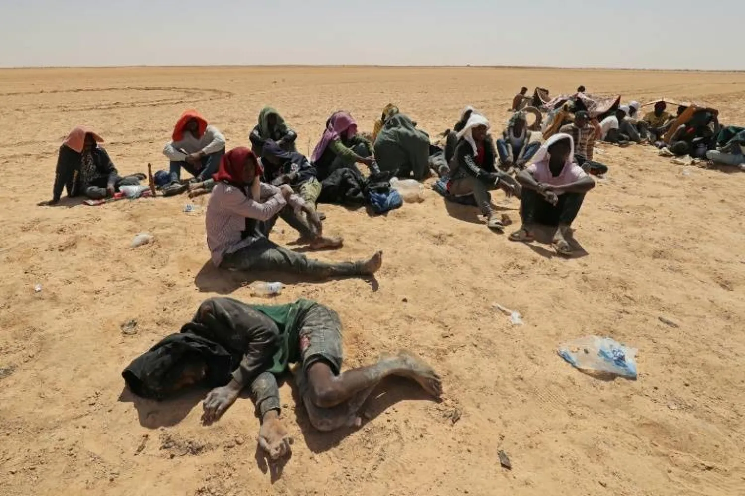Migrants from sub-Saharan African countries were found in an uninhabited area near the Tunisia-Libya border where they say they were dumped by authorities
Mahmud Turkia - AFP