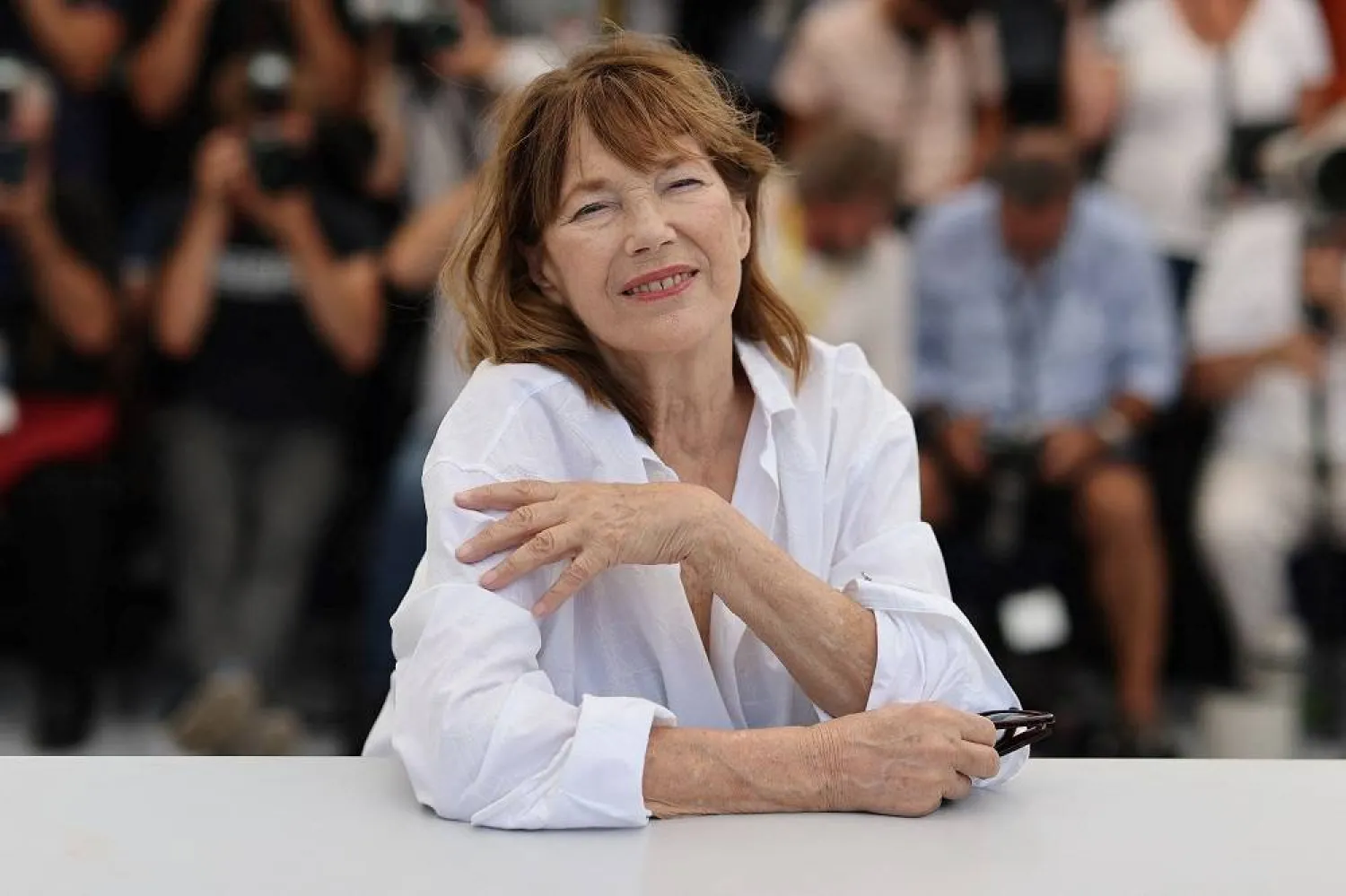 British singer and actress Jane Birkin poses during a photocall for the film "Jane par Charlotte" (Jane By Charlotte) at the 74th edition of the Cannes Film Festival in Cannes, southern France, on July 8, 2021. (AFP)