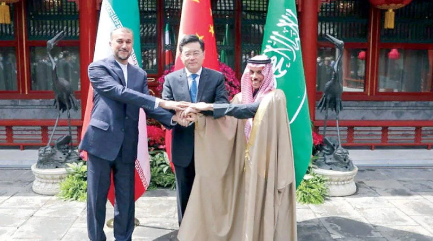 وزراء خارجية السعودية والصين وإيران في بكين (إ.ب.أ)