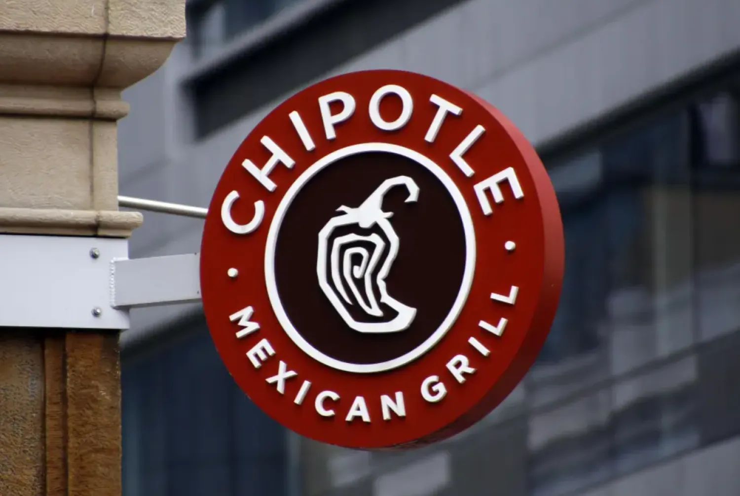 FILE - A sign for the Chipotle restaurant in Pittsburgh’s Market Square is pictured Feb. 8, 2016. Restaurants are beginning the new year with a recurring problem: labor shortages. Chipotle said Thursday, Jan. 26, 2023, that it is looking to hire 15,000 people in North America to ensure its stores are staffed up ahead of its busy spring season. (AP Photo/Keith Srakocic, File)


