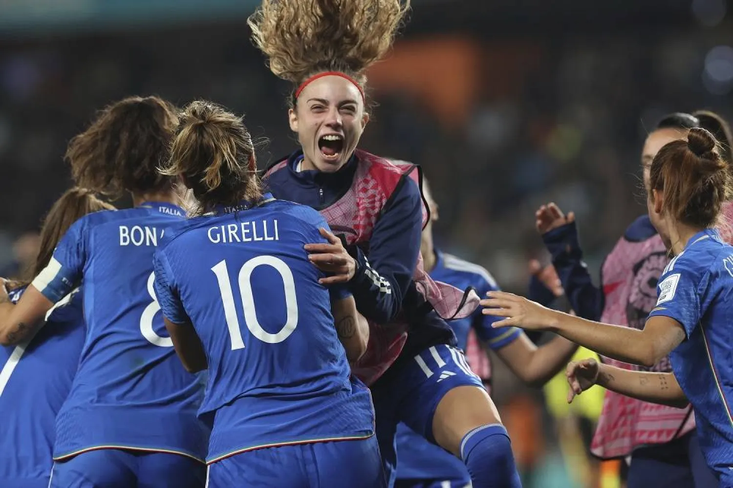 Italy's Cristiana Girelli celebrates with teammates after scoring the opening goal during the Women's World Cup Group G soccer match between Italy and Argentina in Auckland, New Zealand, Monday, July 24, 2023. (AP)