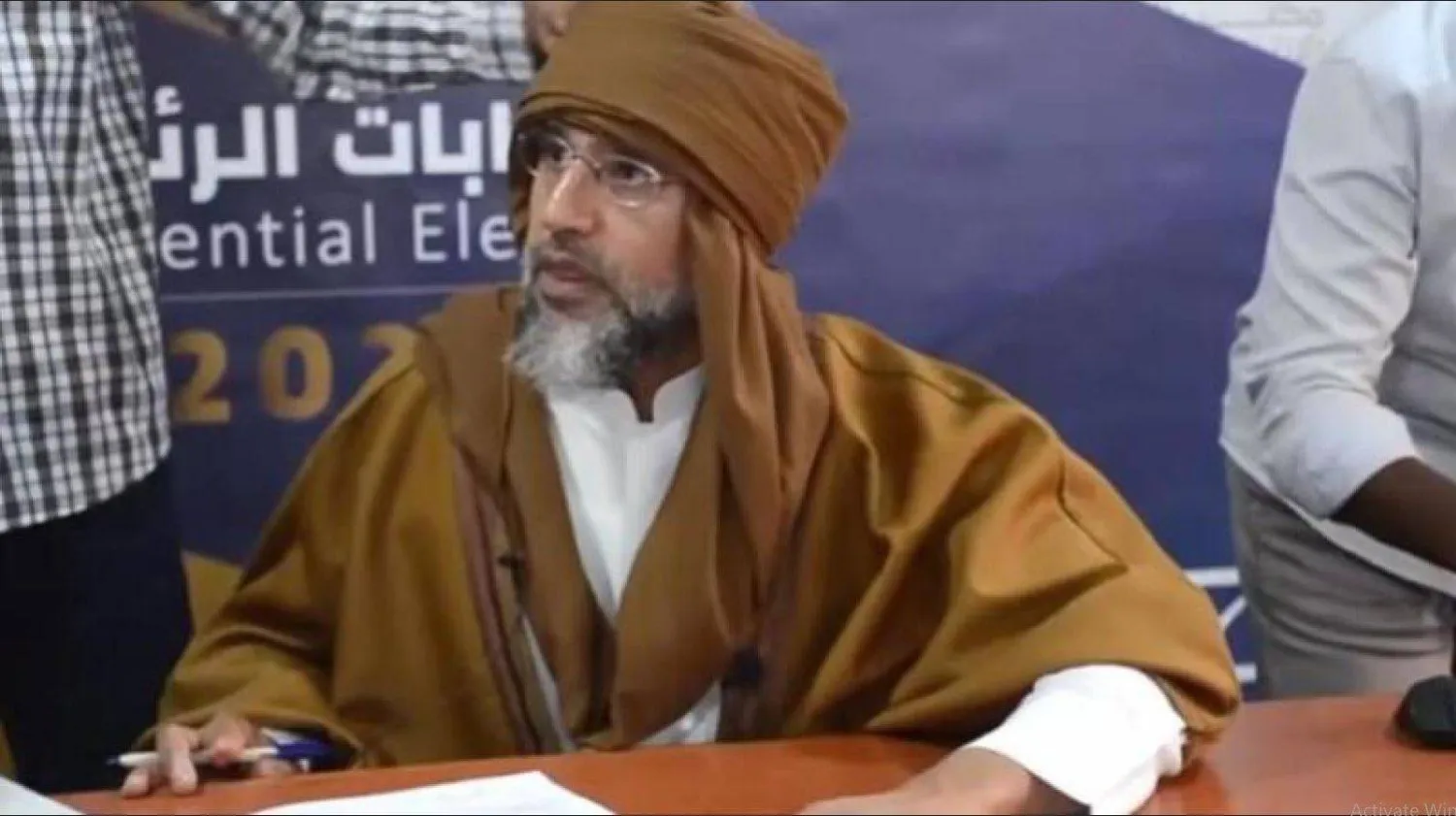 سيف الإسلام القذافي لدى ترشحه للانتخابات الرئاسية في ليبيا نهاية 2021 (مفوضية الانتخابات)