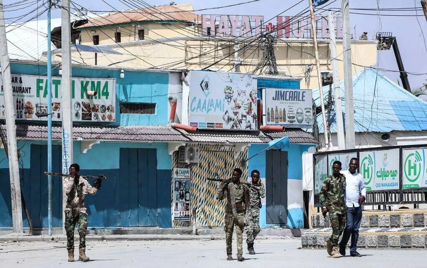 Security officers patrol near the the site of explosions in Mogadishu, Somalia, on August 20, 2022. (AFP)