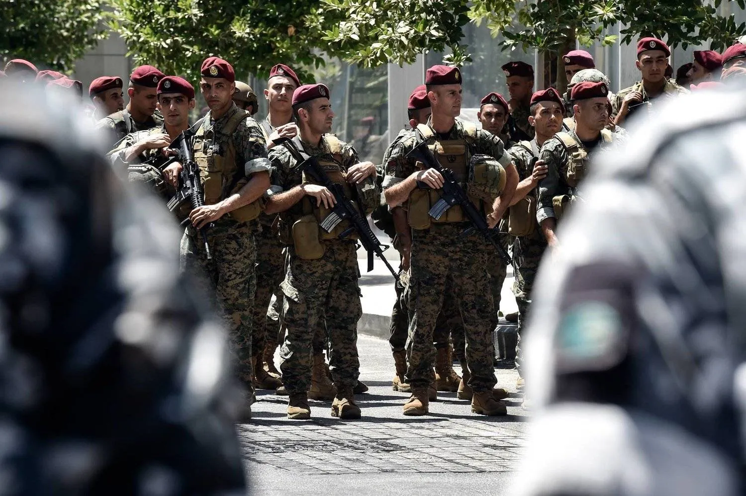 Lebanese army soldiers stand guard in front of a building of the Sweden embassy as protests erupt outside mosques against the Quran desecration, in Beirut, Lebanon, 21 July 2023. EPA/WAEL HAMZEH