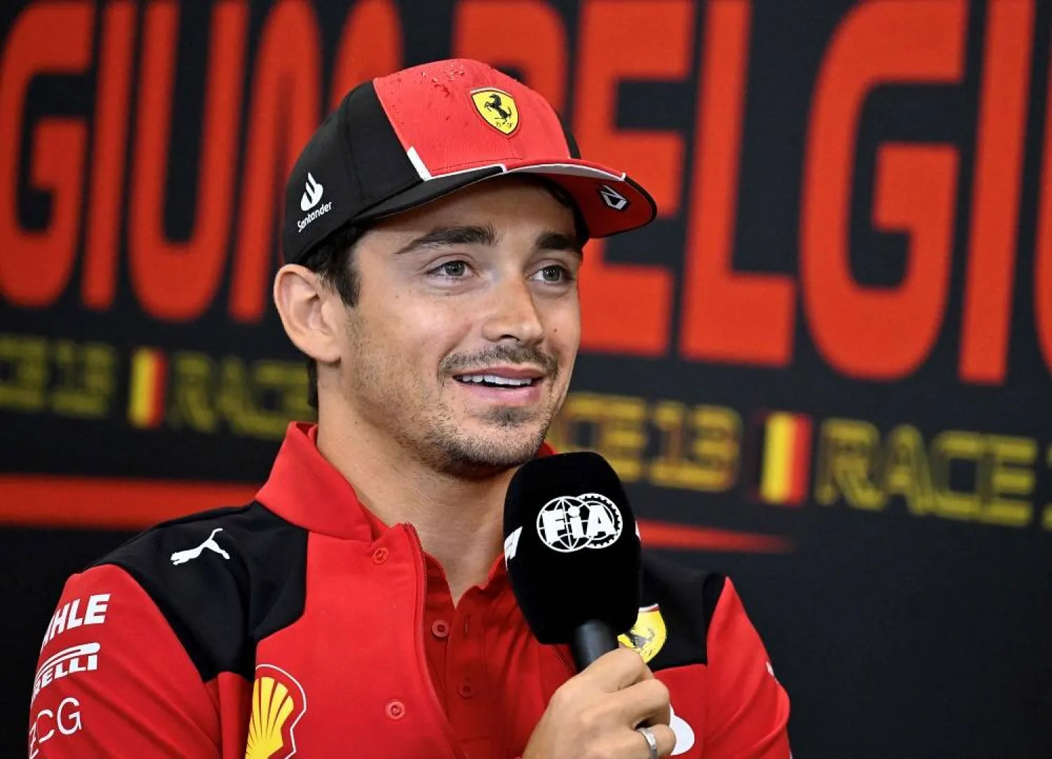 Ferrari's Monegasque driver Charles Leclerc talks during a press conference ahead of the Formula One Belgian Grand Prix at the Spa-Francorchamps circuit in Spa on July 27, 2023. (AFP)