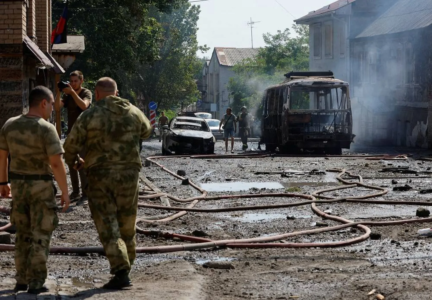 Emergencies services members work at the site of a shelling in the course of Russia-Ukraine conflict in Donetsk, Russian-controlled Ukraine, July 31, 2023. (Reuters)