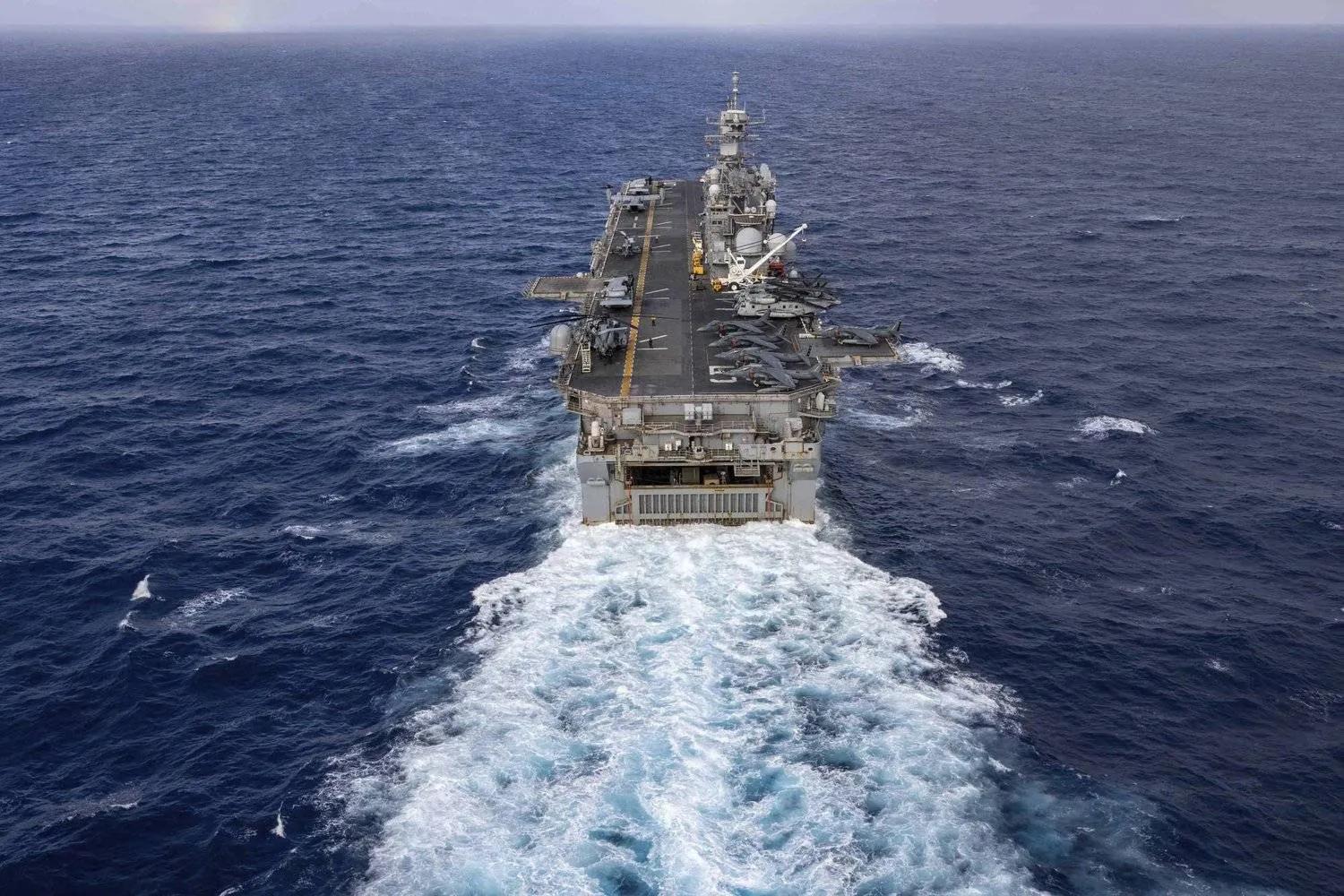 A handout photo from the US Navy shows the amphibious assault ship USS Bataan traveling through the Atlantic Ocean on July 20, 2023. (AP)