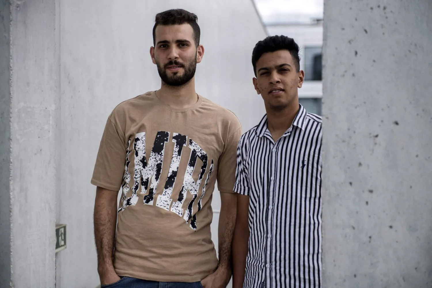 عدي (يسار) وباسل شحيبر (أ.ف.ب)