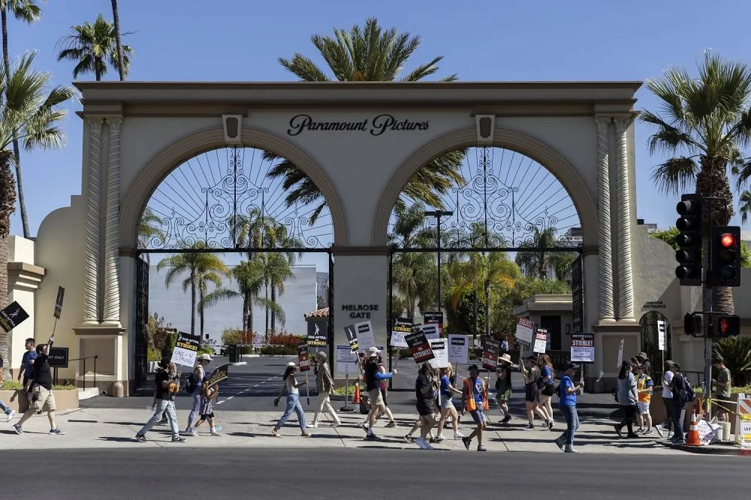  SAG-AFTRA (Screen Actors Guild - American Federation of Television and Radio Artists) members demonstrate with members of the WGA (Writers Guild of America) in front of the Paramount studios in Los Angeles, California, USA, 14 July 2023. (EPA) 