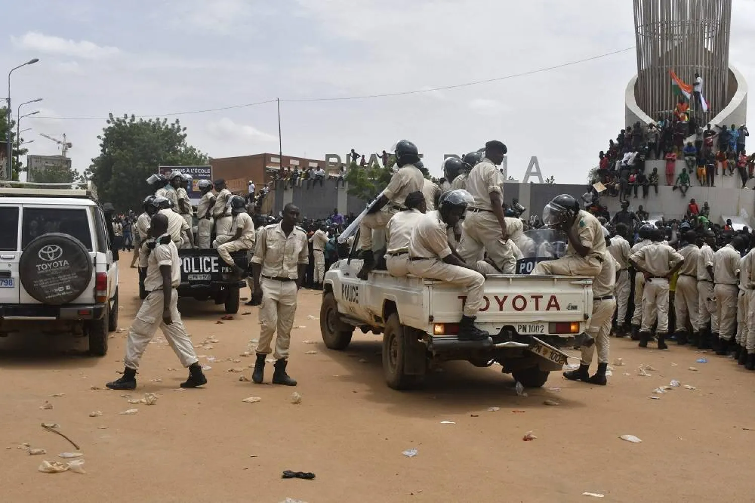 Nigerien policemen are seen as supporters rally in support of Niger's junta in Niamey on July 30, 2023. (AFP)