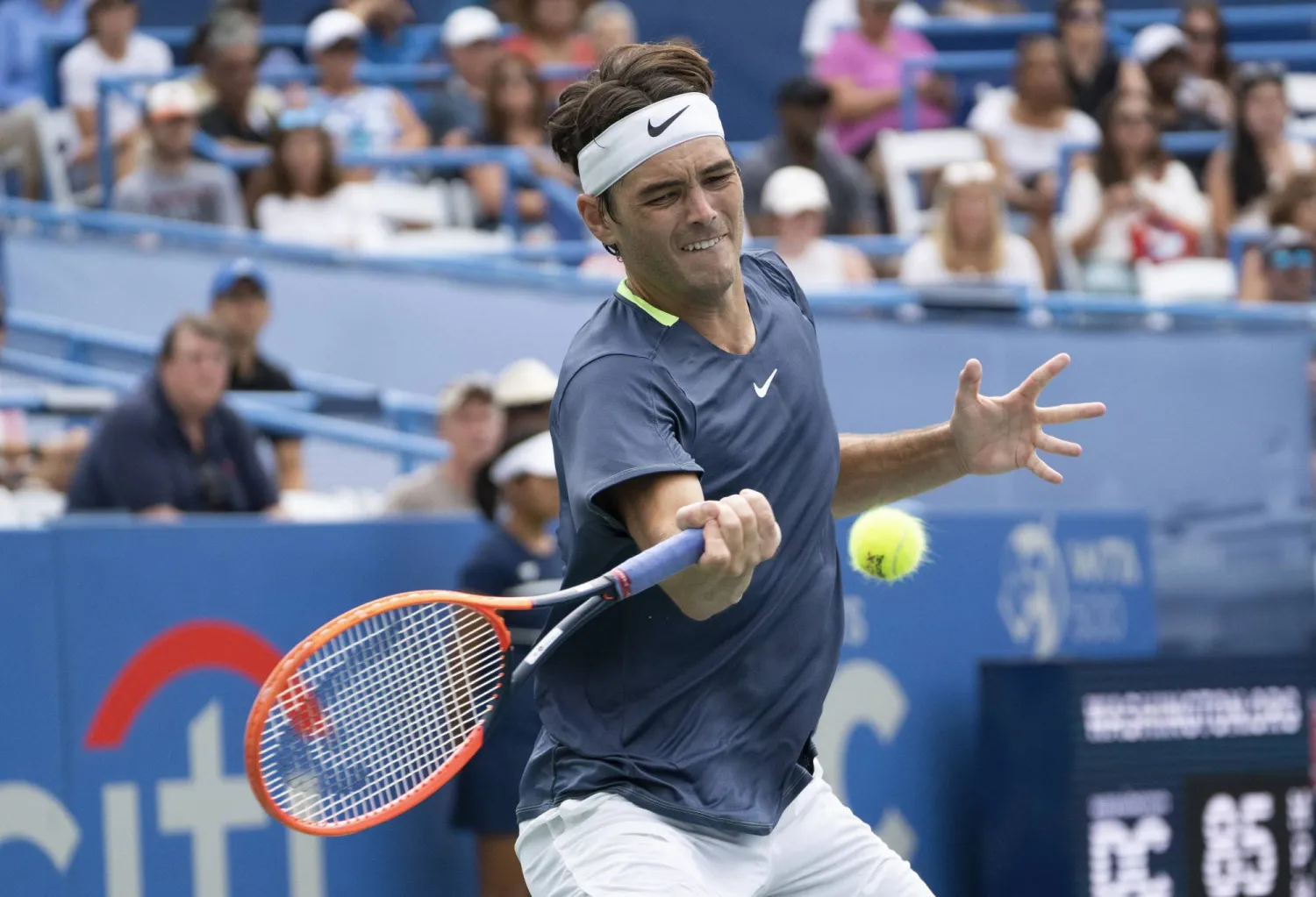 Taylor Fritz, of the United States, hits a forehand to Andy Murray, of Britain, during the DC Open tennis tournament Friday, Aug. 4, 2023, in Washington. (Minh Connors/The Washington Post via AP)