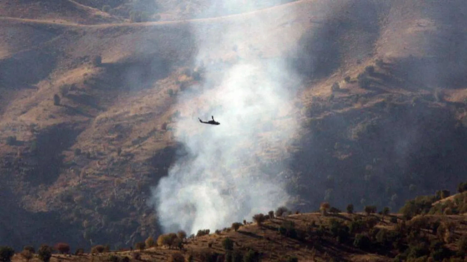 Turkish helicopters fly during an attack on a Kurdistan Workers Party camp Oct. 30, 2007 in the Cudi mountains, Sirnak province, near the Turkish-Iraqi border, southeastern Türkiye. MUSTAFA OZER/AFP via Getty Images

