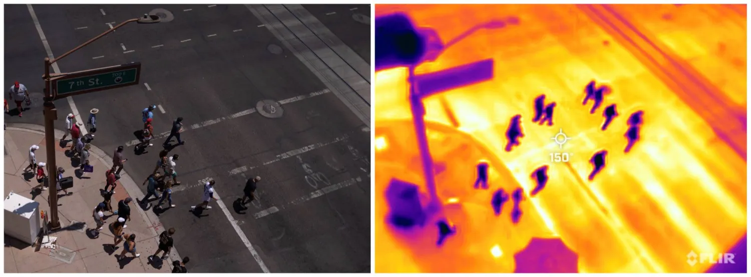 صورة جوية لعبور مجموعة من المشجعين الطريق أمام أحد استادات البيسبول حيث سجلت الكاميرا 150 درجة بمقياس فهرنهايت أي ما يوازي 65 درجة مئوية (رويترز)