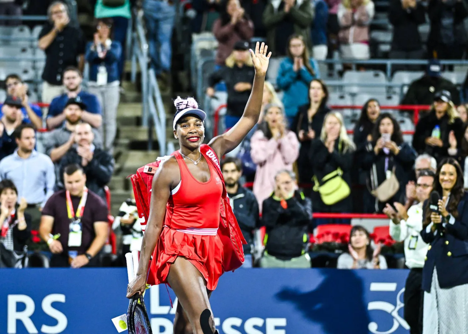 MONTREAL, CANADA - AUGUST 07: Venus Williams of the United States salutes the spectators as she walks off the court after her loss to Madison Keys of the United States on Day 1 during the National Bank Open at Stade IGA on August 7, 2023 in Montreal, Canada.   Minas Panagiotakis/Getty Images/AFP 