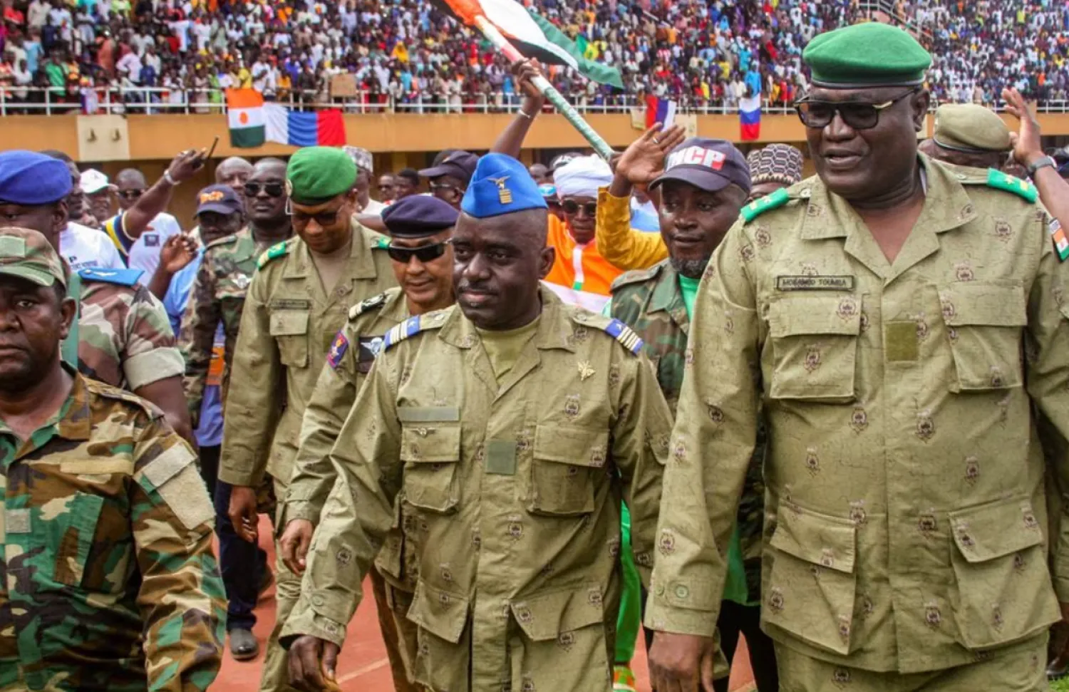 Members of a military council that staged a coup in Niger attend a rally at a stadium in Niamey, Niger, August 6, 2023. REUTERS/Mahamadou Hamidou/File Photo



