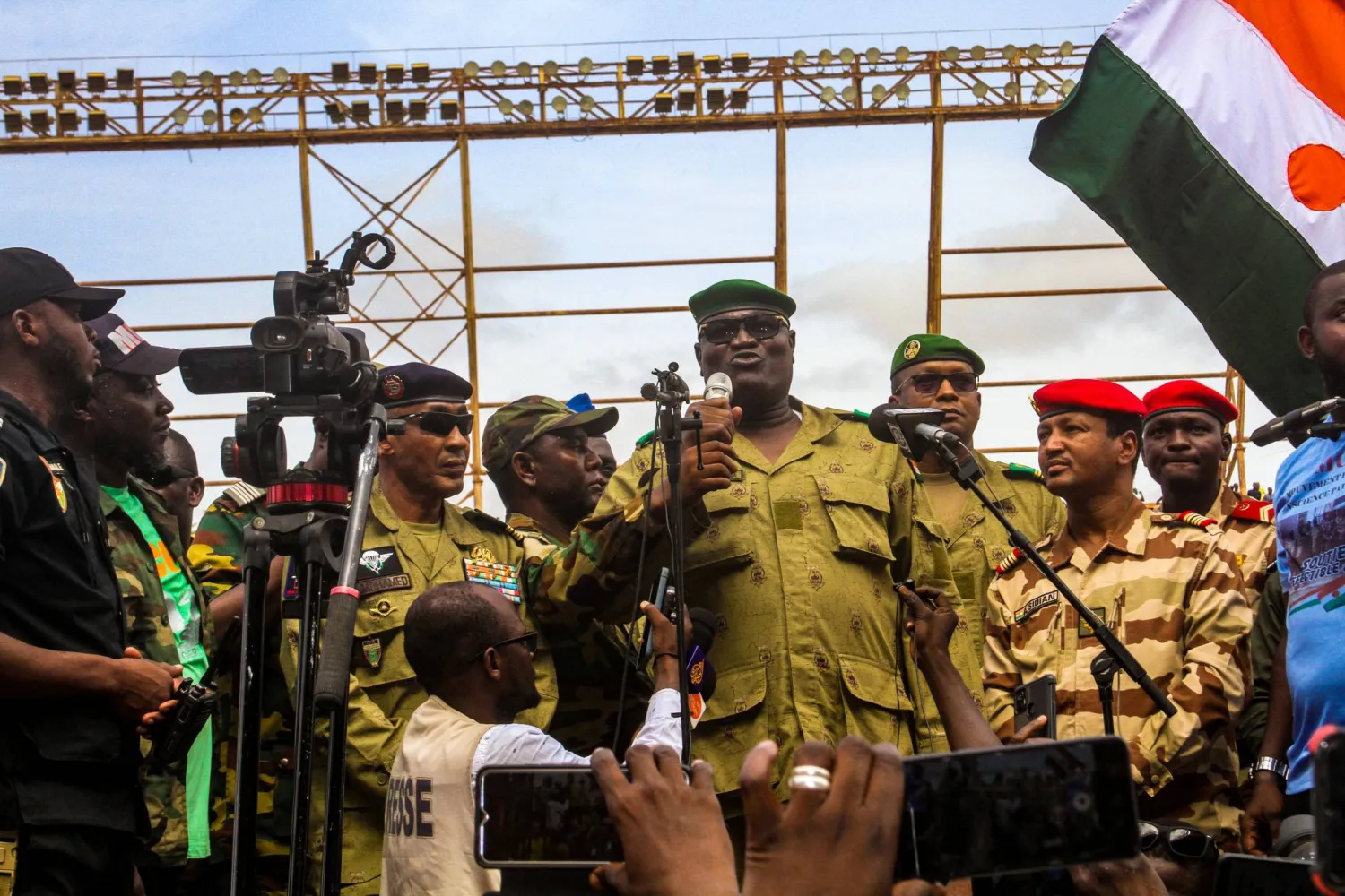 Members of a military council that staged a coup in Niger attend a rally at a stadium in Niamey, Niger, August 6, 2023. REUTERS/Mahamadou Hamidou 