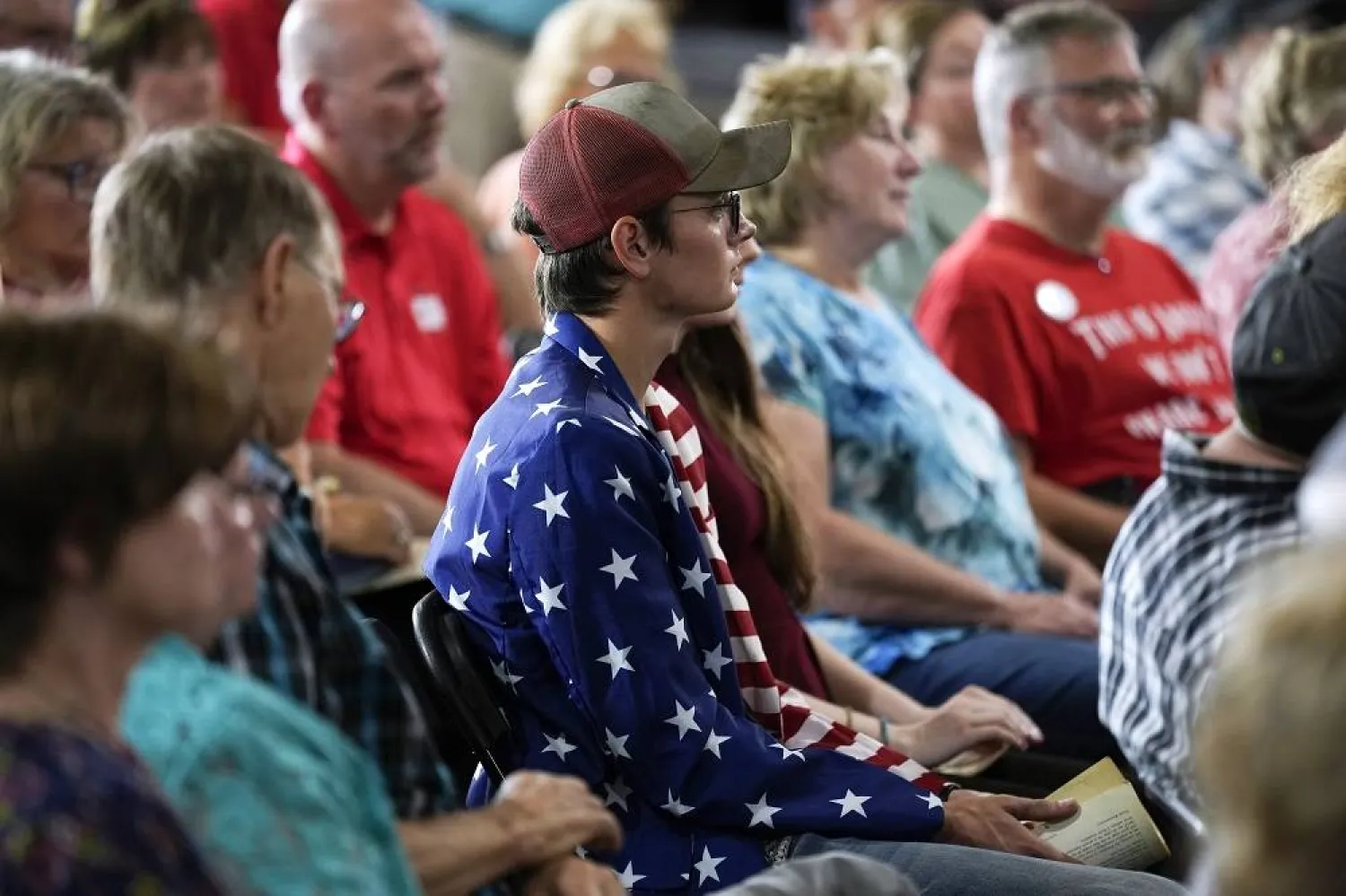 Audience members listen to Republican presidential candidate Vivek Ramaswamy speak during a campaign stop, Saturday, Aug. 5, 2023, in Vail, Iowa. (AP)