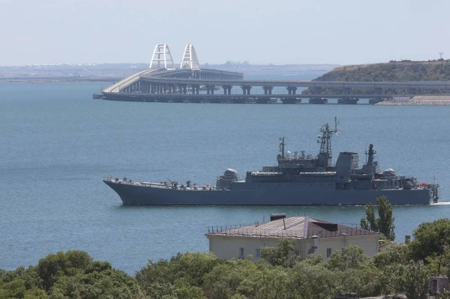 A Russian military landing ship, which now transports cars and people between Crimea and Taman because the Crimean Bridge connecting Russian mainland and Crimean peninsula over the Kerch Strait is closed, sails not far from Kerch, Crimea, on Monday, July 17, 2023. (AP)
