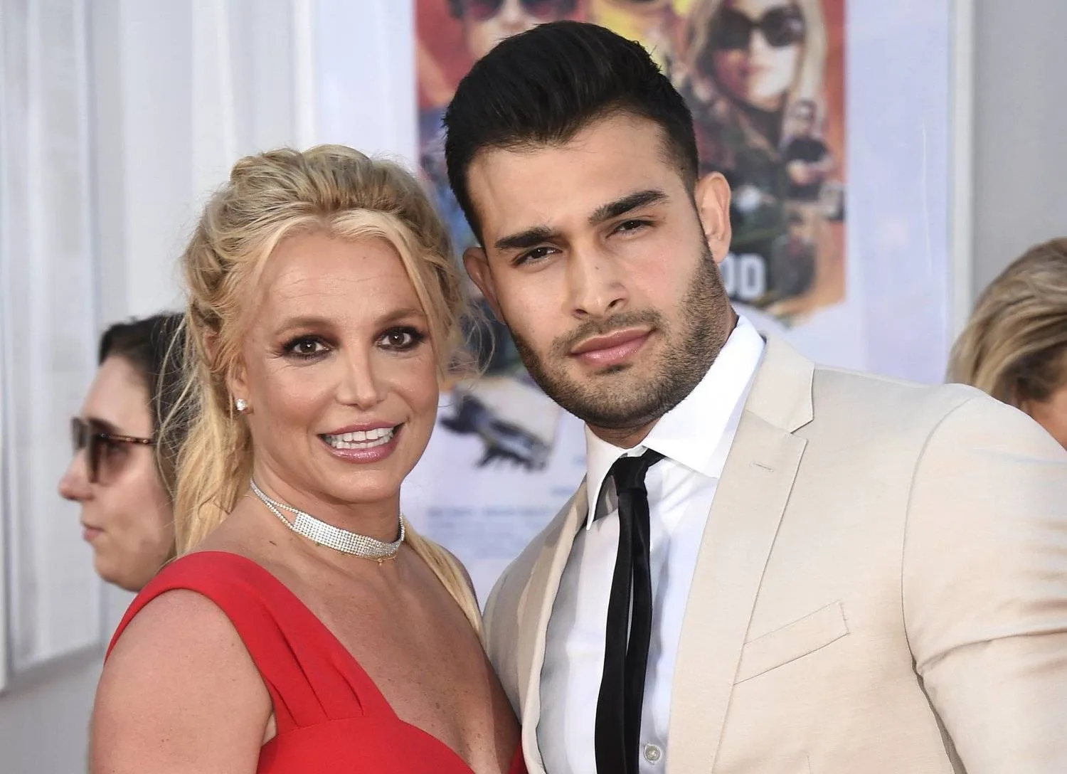 FILE - Britney Spears and Sam Asghari appear at the Los Angeles premiere of "Once Upon a Time in Hollywood" on July 22, 2019. (Photo by Jordan Strauss/Invision/AP, File)
